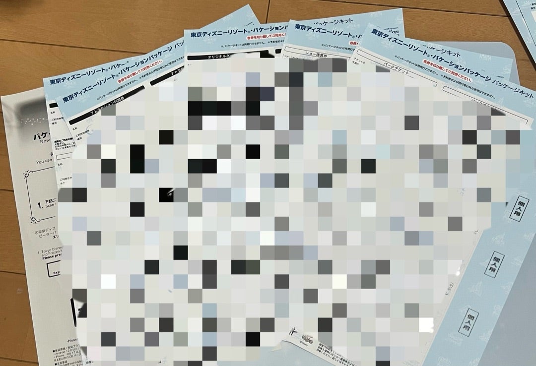 Paper tickets included in a Tokyo Disney Vacation Package kit